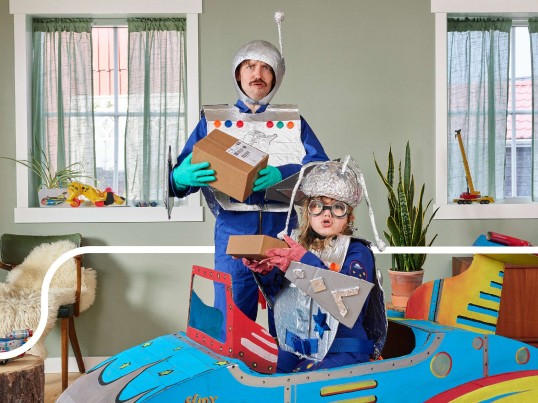 Father and son with a parcel