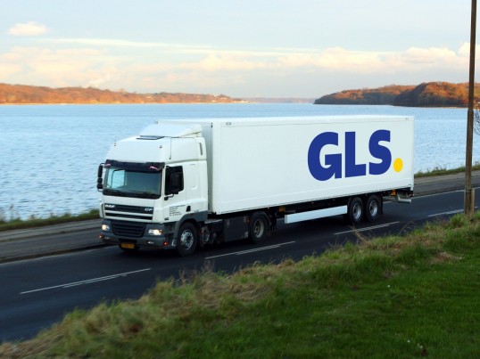 GLS trailers crossing over a bridge