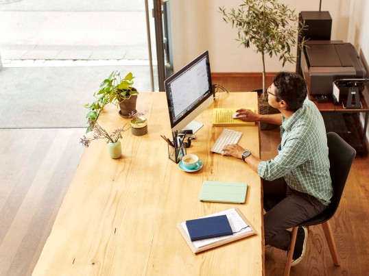 man working on computer 