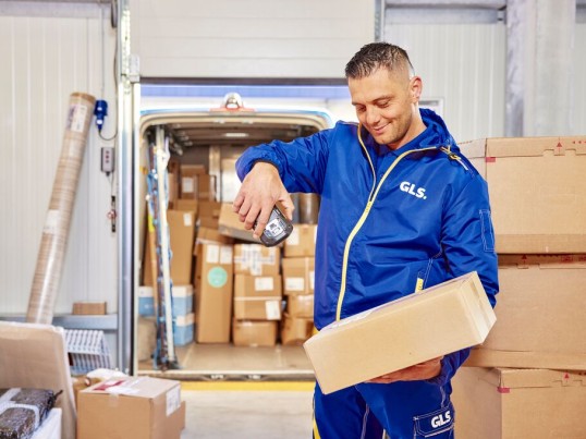 GLS trainee working on a night loading and sorting parcels