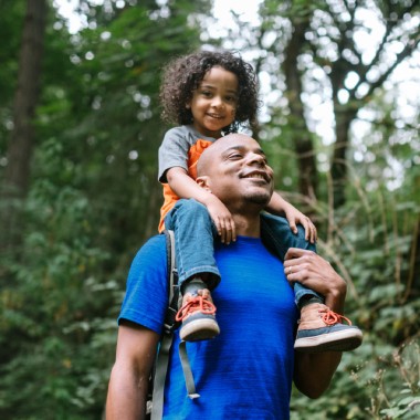 Father and child in the middle of nature