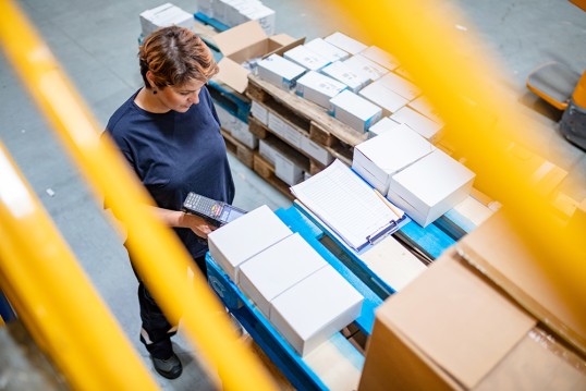 GLS worker checking on parcel labels