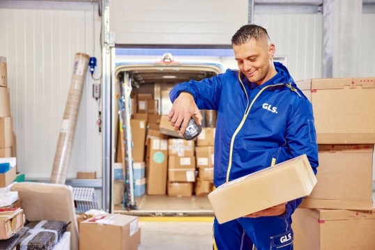GLS delivery driver scanning a parcel