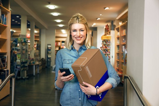 Parcel delivery by woman 